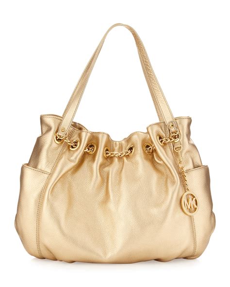 michael kors metallic purse recall